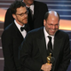 Producer Scott Rudin accepts the Oscar for best feature film for No Country for Old Men as winners for best director for the same film, Joel and Ethan Coen, look on during the 80th annual Academy Awards in Hollywood, Calif., on Feb. 24, 2008.
GABRIEL BOUYS/AFP/Getty Images